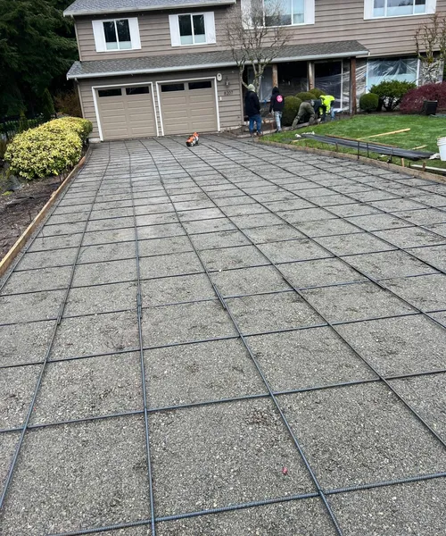 Broom Finish Driveway With Decorative Borders in Edmonds 